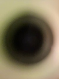 a blurry image of a toilet