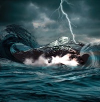 a stormy ocean with a lightning bolt in the sky